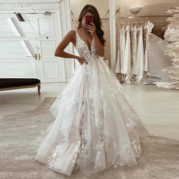 Красива елегантна лейси апликация Сватбени рокли на Русалка, без ръкави с отворен гръб Елегантна сватбена рокля с дълбоко V-образно деколте на спагети презрамки-спагети
